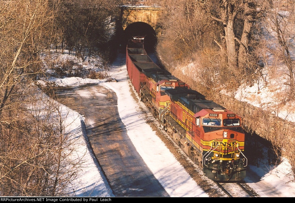 All rail ore loads cruise east out of the tunnel